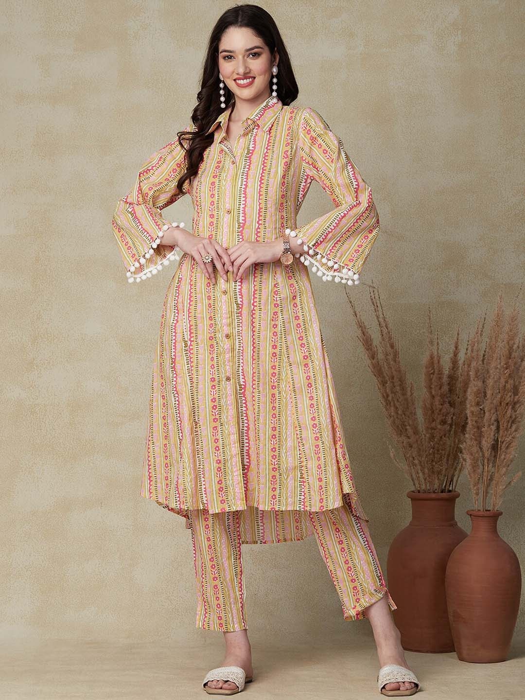 FASHOR Yellow Floral Printed Shirt Collar Flared Sleeves A-Line Cotton Kurta With Trousers
FASHOR Yellow Floral Printed Shirt Collar Flared Sleeves A-Line Cotton Kurta With Trousers