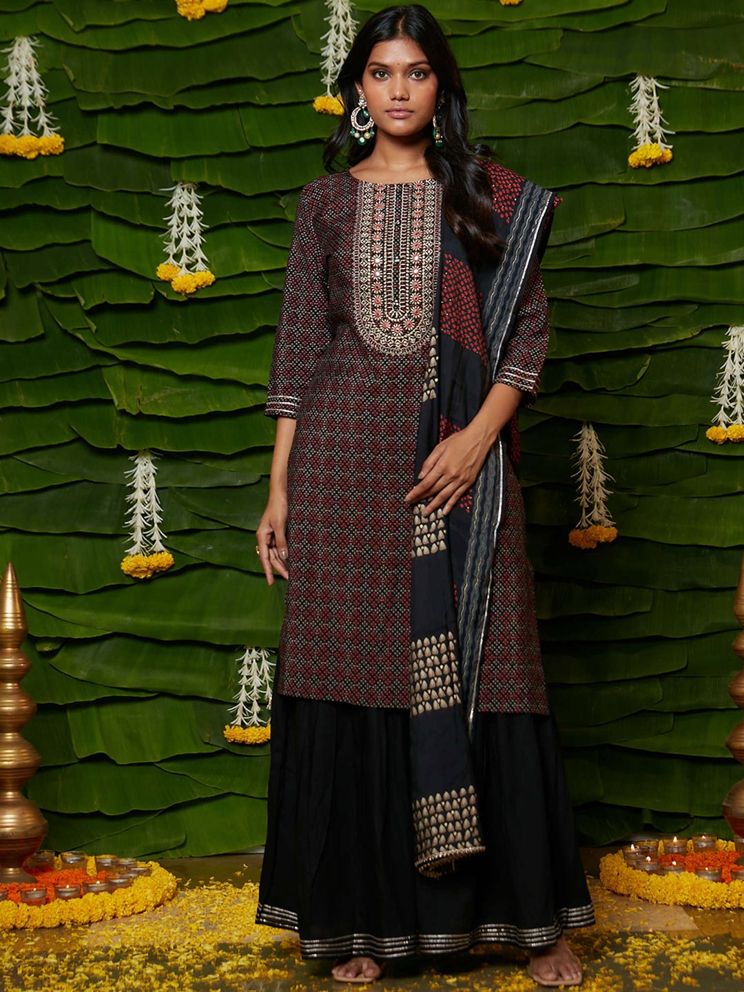 RAISIN Ethnic Motifs Printed Thread Work Detail Pure Cotton Kurta & Sharara With Dupatta, Black
RAISIN Ethnic Motifs Printed Thread Work Detail Pure Cotton Kurta & Sharara With Dupatta, Black