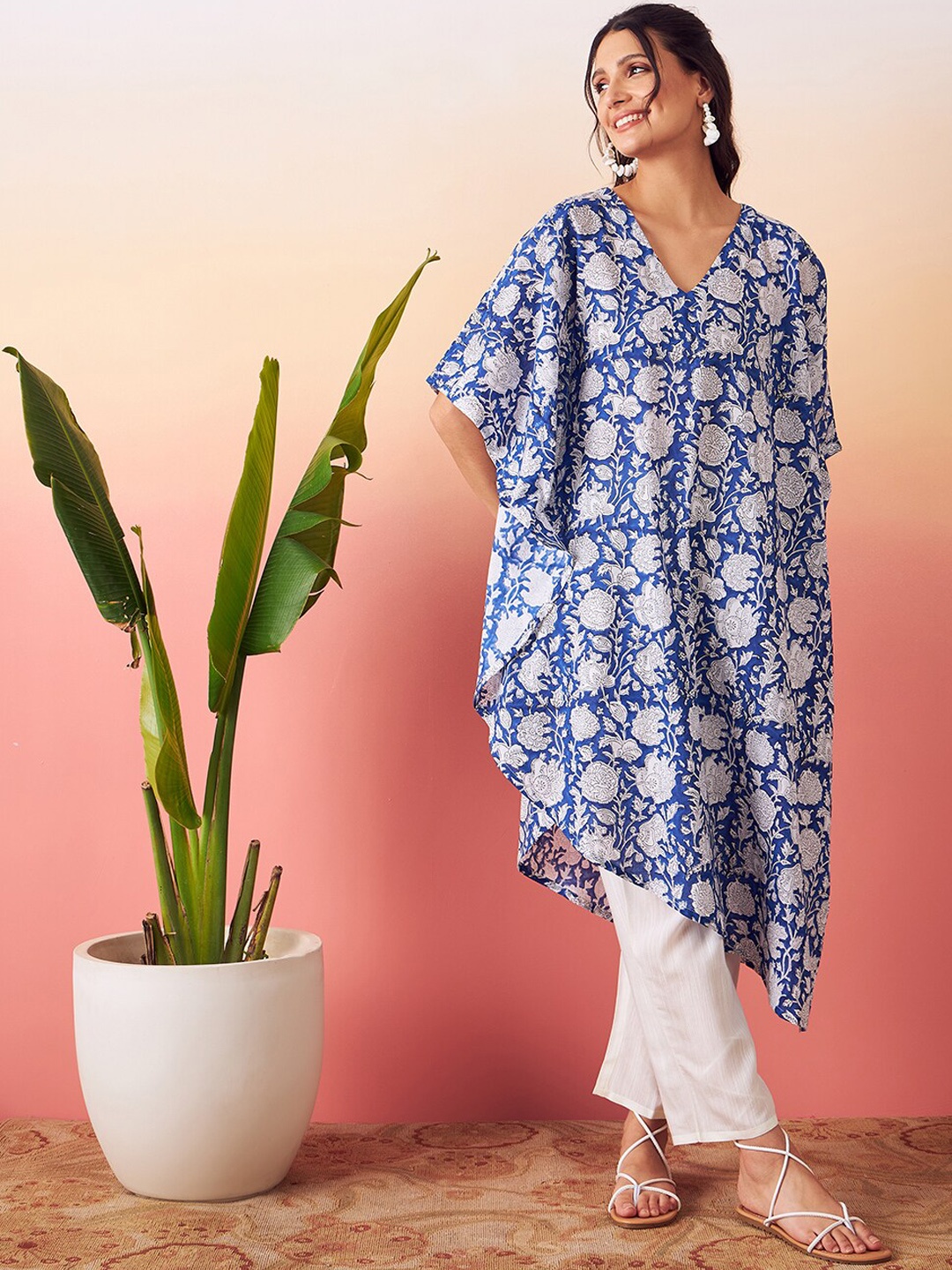 stories of dori Floral Printed V-Neck Flared Sleeves Kaftan Kurta With Trousers, Blue
stories of dori Floral Printed V-Neck Flared Sleeves Kaftan Kurta With Trousers, Blue