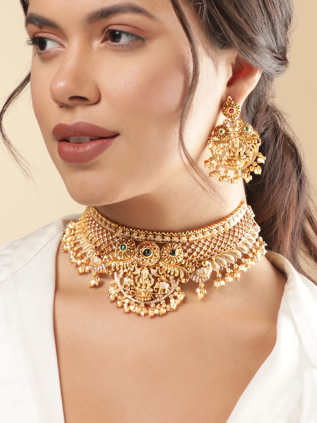 Rubans 22K Gold-Plated Ruby & Emerald CubicZirconia Studded Laxmi Motif Choker NecklaceSet
Rubans 22K Gold-Plated Ruby & Emerald CubicZirconia Studded Laxmi Motif Choker NecklaceSet