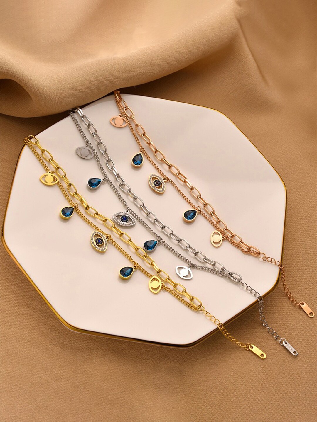 Designs & You Set Of 3 American Diamond Gold-Plated Stainless Steel Wraparound Bracelet
Designs & You Set Of 3 American Diamond Gold-Plated Stainless Steel Wraparound Bracelet