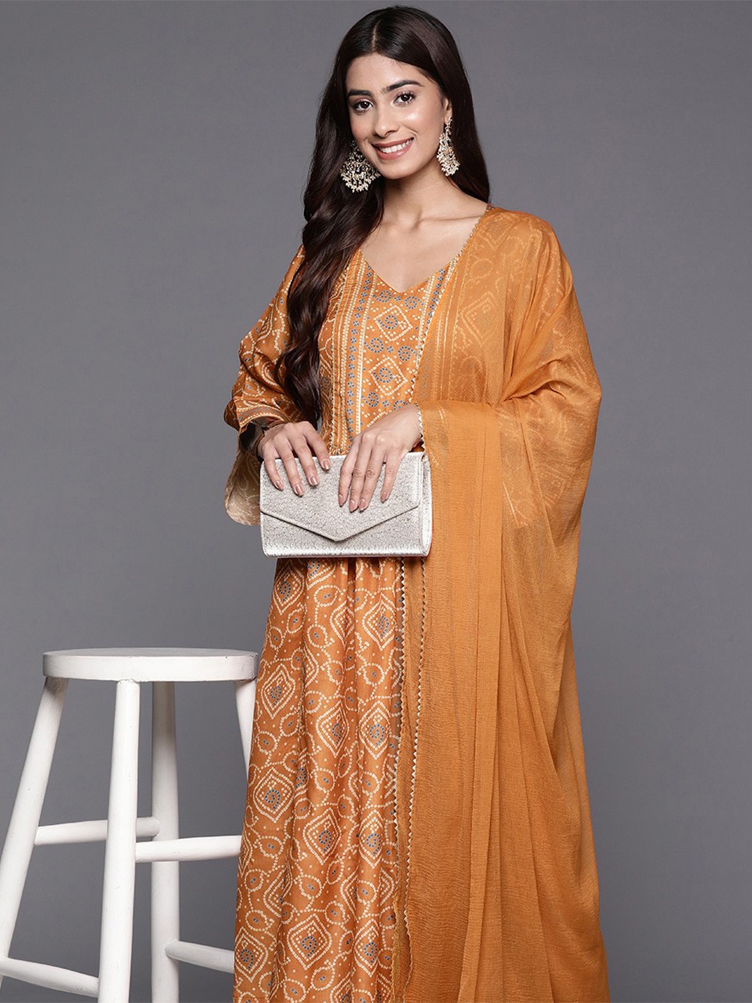 Varanga Women Bandhani Printed Empire Gotta Patti Kurta with Trousers & Dupatta, Rust
Varanga Women Bandhani Printed Empire Gotta Patti Kurta with Trousers & Dupatta, Rust