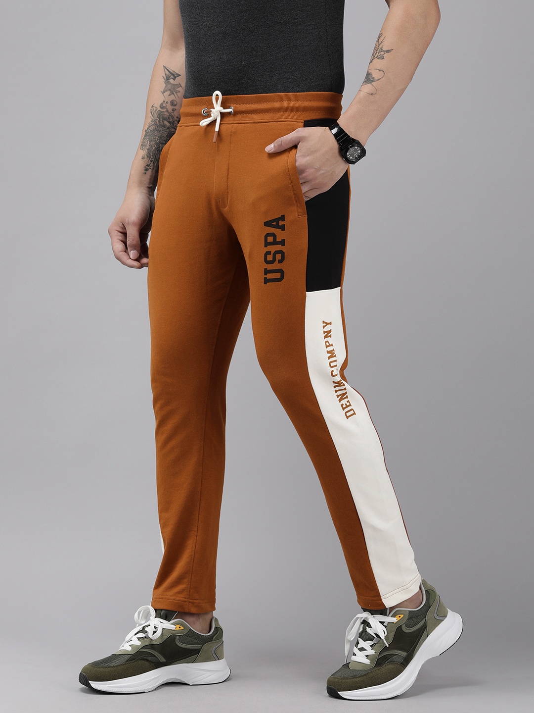 U.S. Polo Assn. Denim Co. Men Brand Logo Printed Regular Mid Rise Track Pant, Tan
U.S. Polo Assn. Denim Co. Men Brand Logo Printed Regular Mid Rise Track Pant, Tan