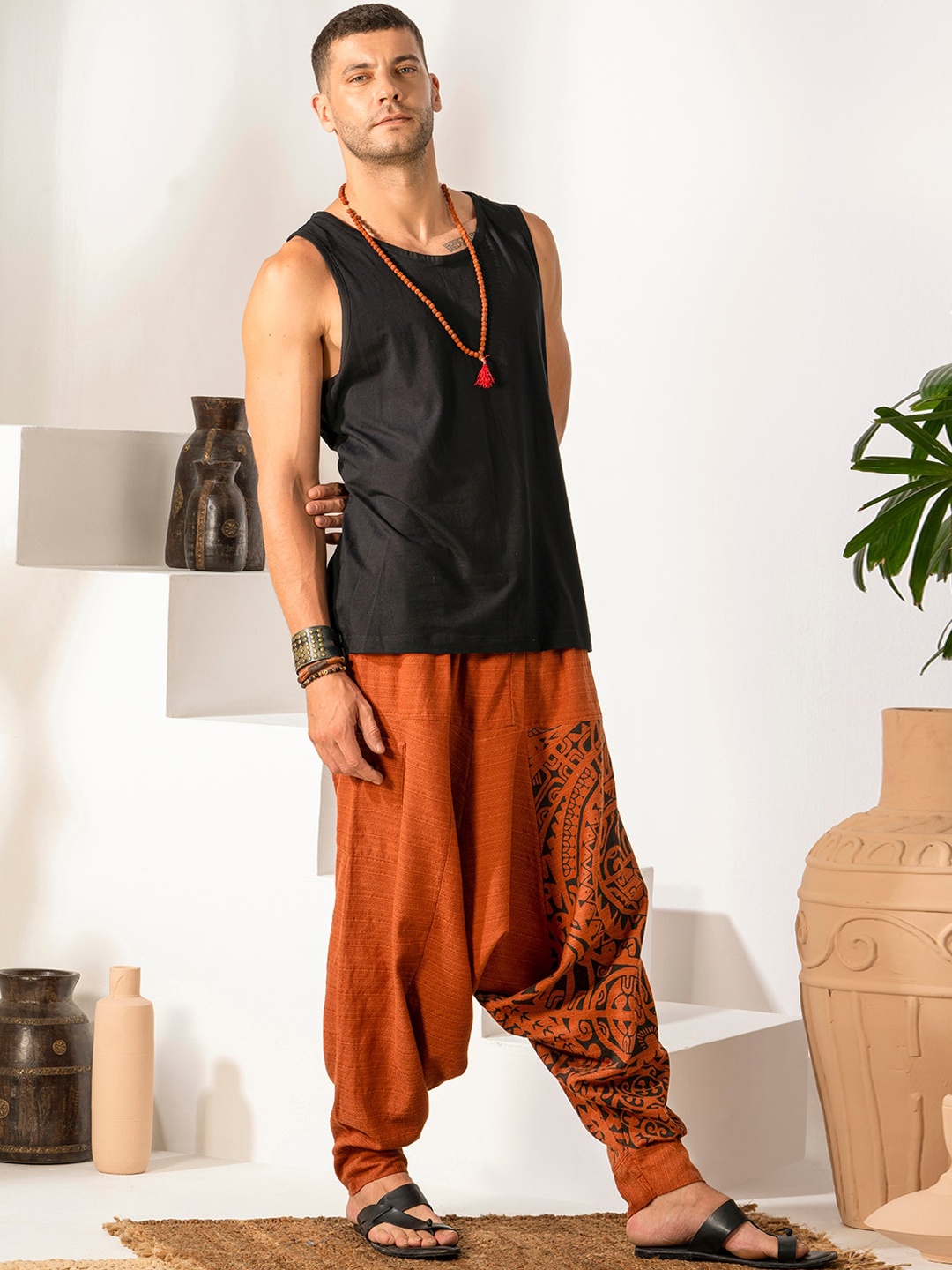 The Veshti Company Men Tribal Printed Pure Cotton Pleated Ankle-Length Harem Pants, Orange
The Veshti Company Men Tribal Printed Pure Cotton Pleated Ankle-Length Harem Pants, Orange