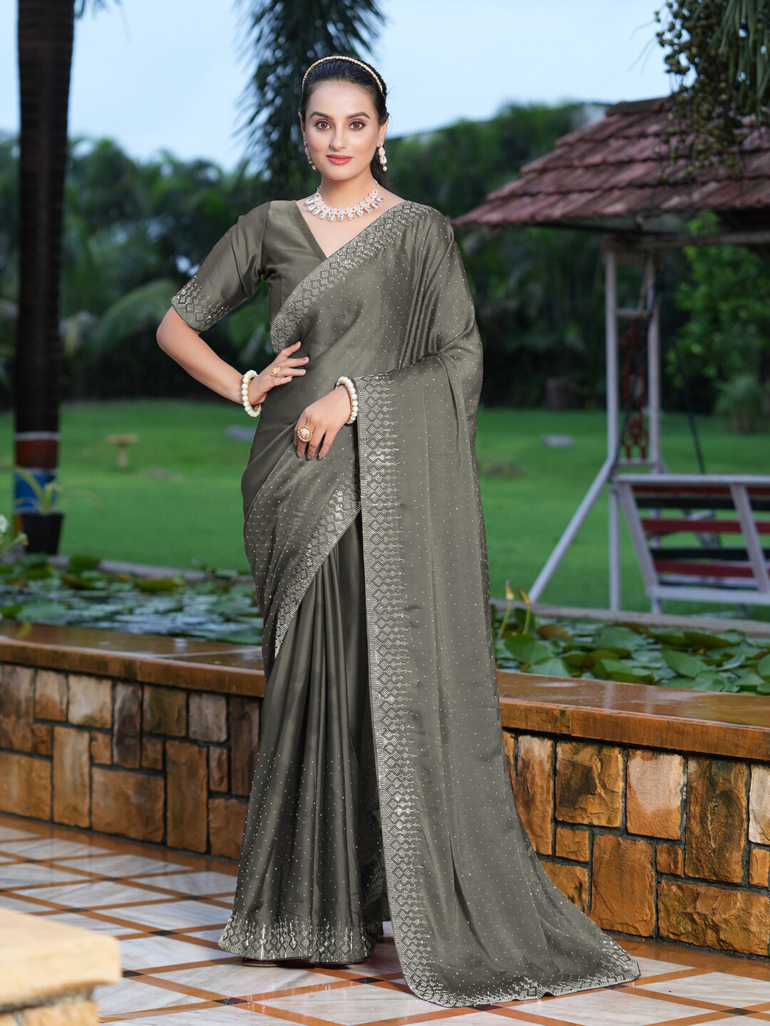 Satrani Grey Embellished Beads and Stones Saree
Satrani Grey Embellished Beads and Stones Saree