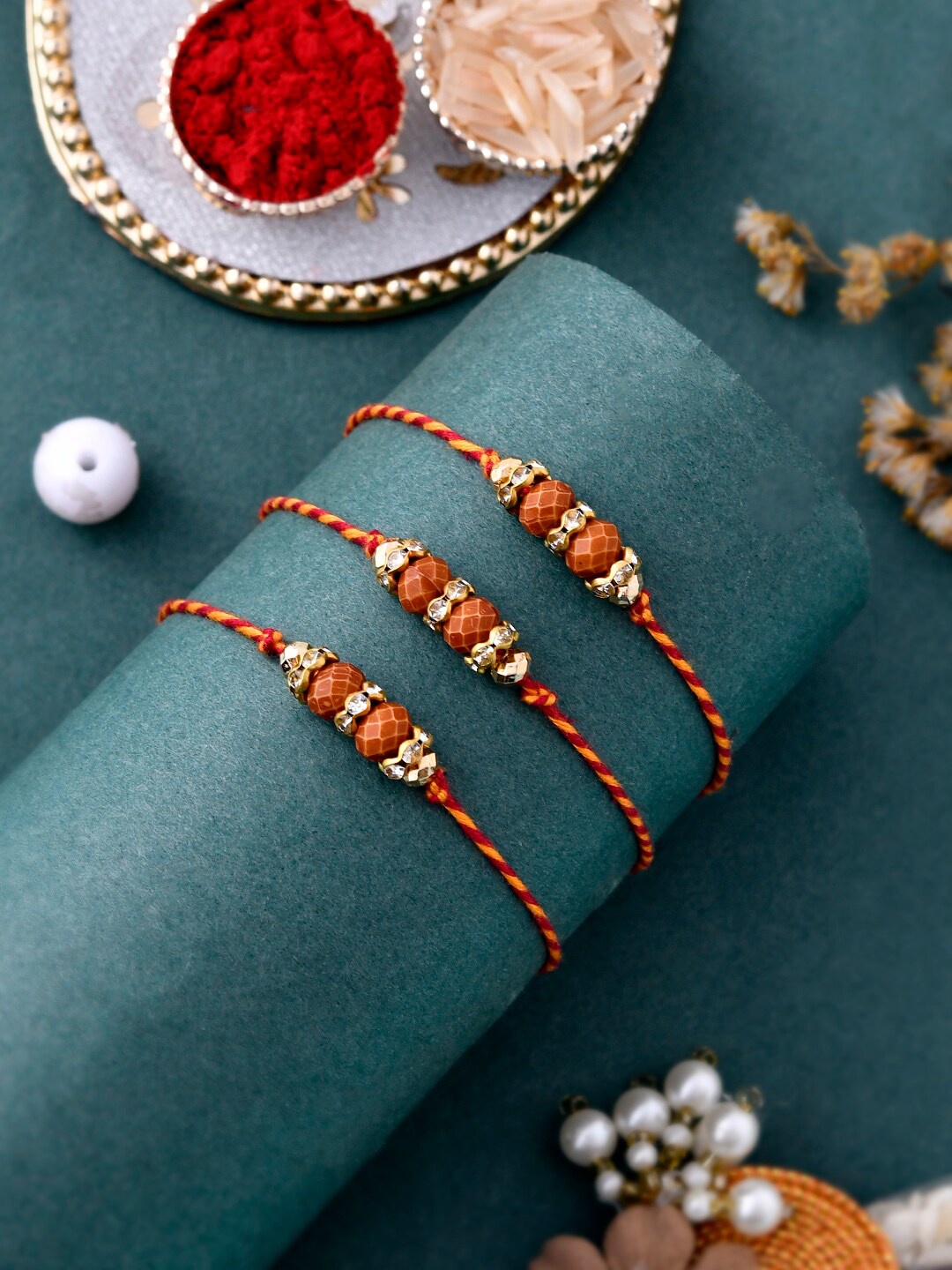 Aapno Rajasthan Unisex Set Of 3 Rudraksha & Beads Royal Rakhi With Roli Chwal & Card, Gold
Aapno Rajasthan Unisex Set Of 3 Rudraksha & Beads Royal Rakhi With Roli Chwal & Card, Gold