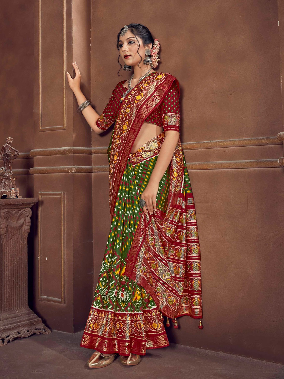 Mitera Green & Maroon Ethnic Motifs Zari Patola Saree