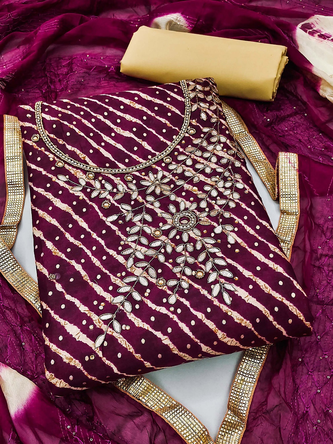 KALINI Leheriya Printed Beads & Stones Ornamented Unstitched Dress Material, Burgundy
KALINI Leheriya Printed Beads & Stones Ornamented Unstitched Dress Material, Burgundy