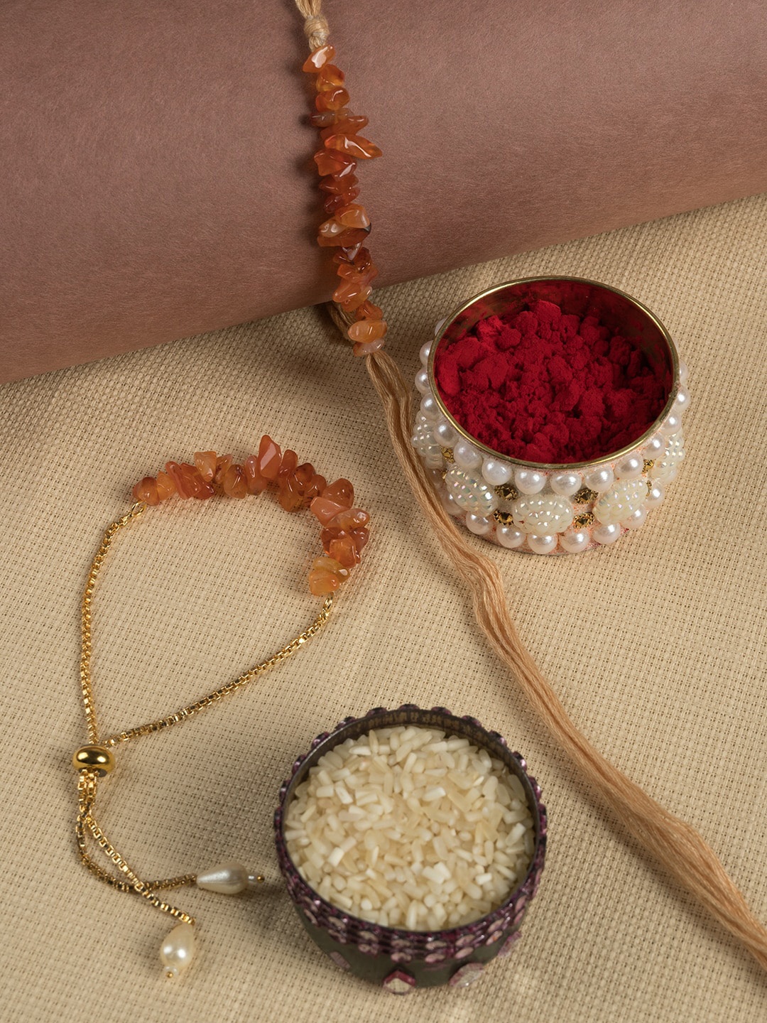 SHOOLIN Set Of 2 Beads-Studded Bhai-Bhabhi Rakhi With Roli Chawal & Greeting Card, Brown
SHOOLIN Set Of 2 Beads-Studded Bhai-Bhabhi Rakhi With Roli Chawal & Greeting Card, Brown