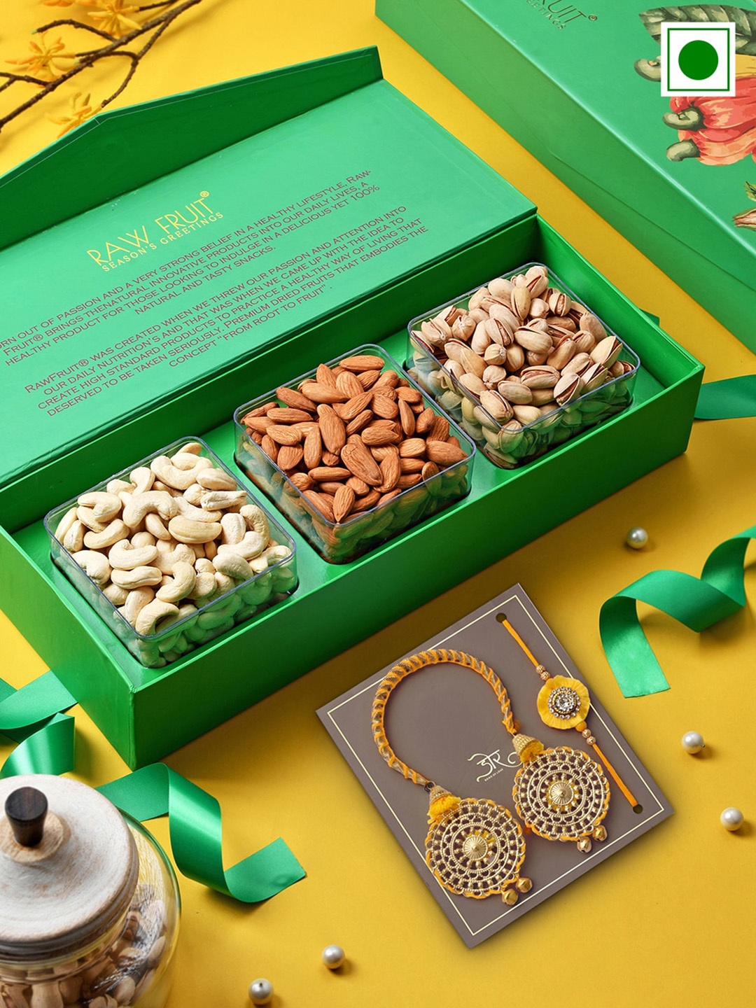 RawFruit Set of 2 Stone-Studded Bhaiya Bhabhi Rakhi With Roli Chawal & Dryfruits Gift Set, Green
RawFruit Set of 2 Stone-Studded Bhaiya Bhabhi Rakhi With Roli Chawal & Dryfruits Gift Set, Green