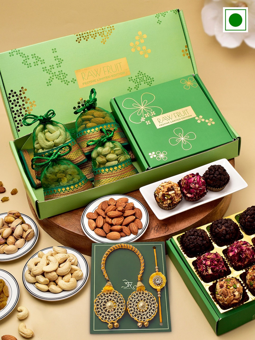 RawFruit Ganesh Charm Beaded Rakhi With Dryfruits & Laddoo Sweets Gift Set 75 gms Each, Yellow
RawFruit Ganesh Charm Beaded Rakhi With Dryfruits & Laddoo Sweets Gift Set 75 gms Each, Yellow