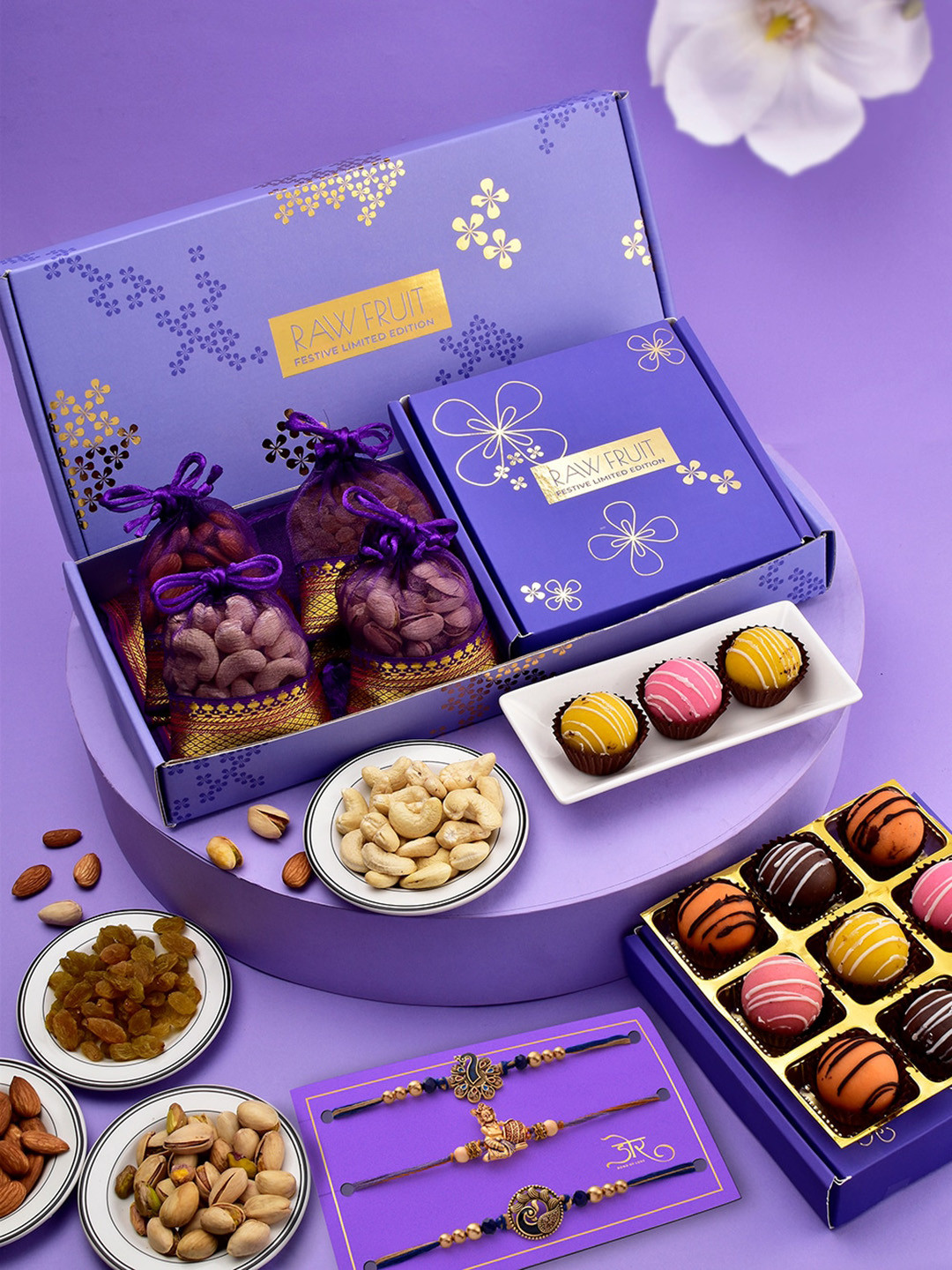 RawFruit Set Of 3 Beaded Rakhi With Sweets & Dryfruit Gift Set, Blue 
RawFruit Set Of 3 Beaded Rakhi With Sweets & Dryfruit Gift Set, Blue