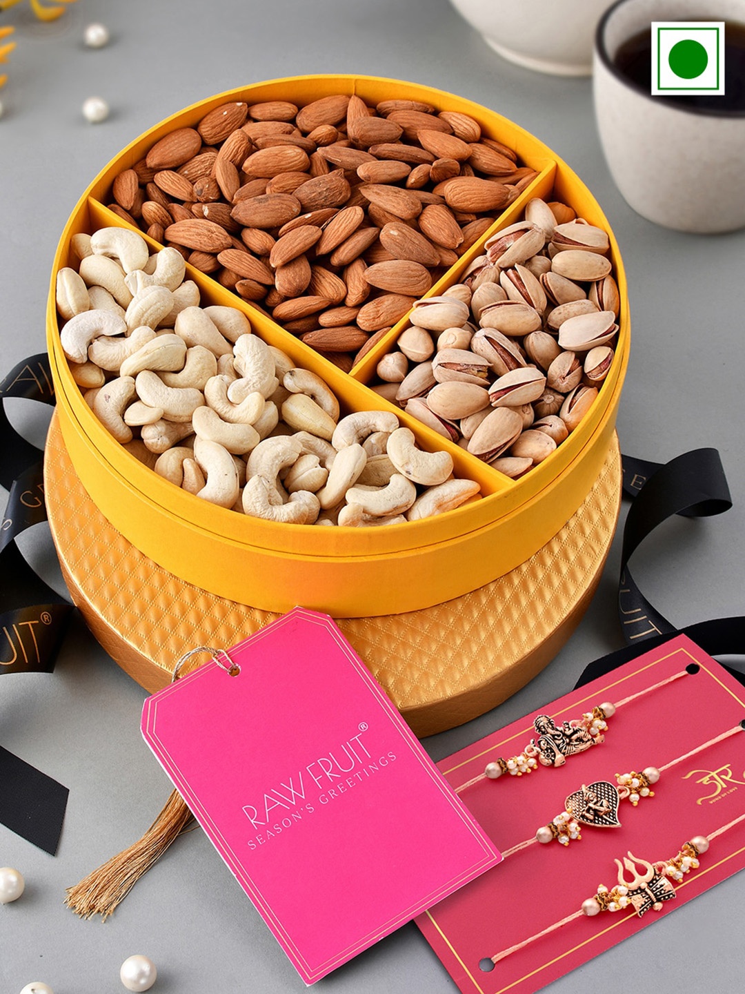 RawFruit Set Of 3 Ganesh Trishul & Krishna Charm Rakhi With Festive Nut Delight Gift Pack, Gold
RawFruit Set Of 3 Ganesh Trishul & Krishna Charm Rakhi With Festive Nut Delight Gift Pack, Gold