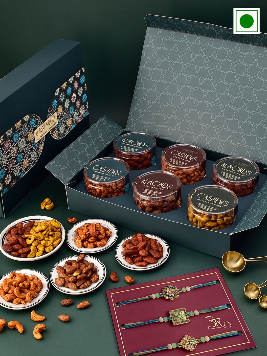 RawFruit Set Of 3 Stone Studded & Beaded Rakhis With Roli Chawal & Dry Fruits Gift Set, Silver
RawFruit Set Of 3 Stone Studded & Beaded Rakhis With Roli Chawal & Dry Fruits Gift Set, Silver