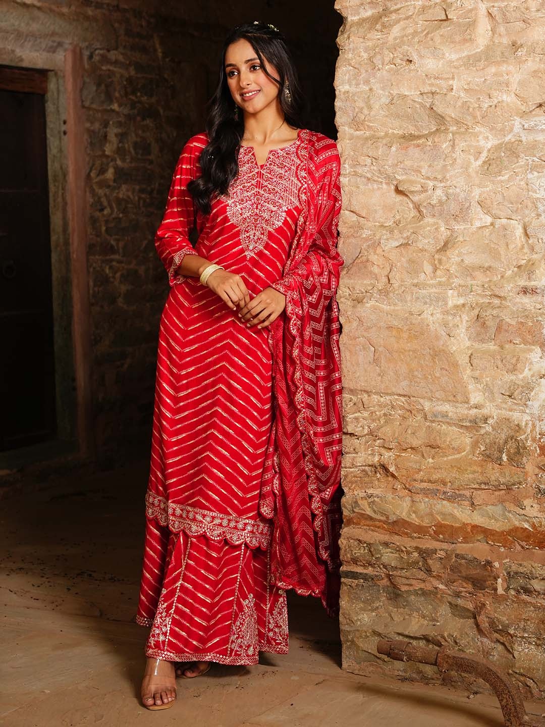 PRATAP SONS Leheriya Printed Panelled Sequinned Kurta With Trousers & Dupatta, Red
PRATAP SONS Leheriya Printed Panelled Sequinned Kurta With Trousers & Dupatta, Red