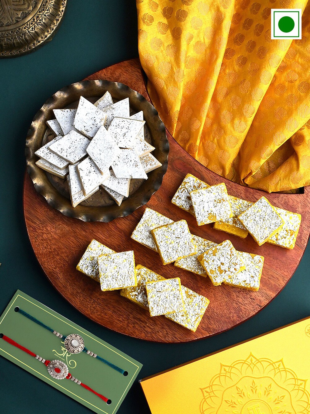 RawFruit Set Of 2 Charm Rakhis With Roli Chawal & Mithai Bliss Sweets-200 gms Each, Blue
RawFruit Set Of 2 Charm Rakhis With Roli Chawal & Mithai Bliss Sweets-200 gms Each, Blue