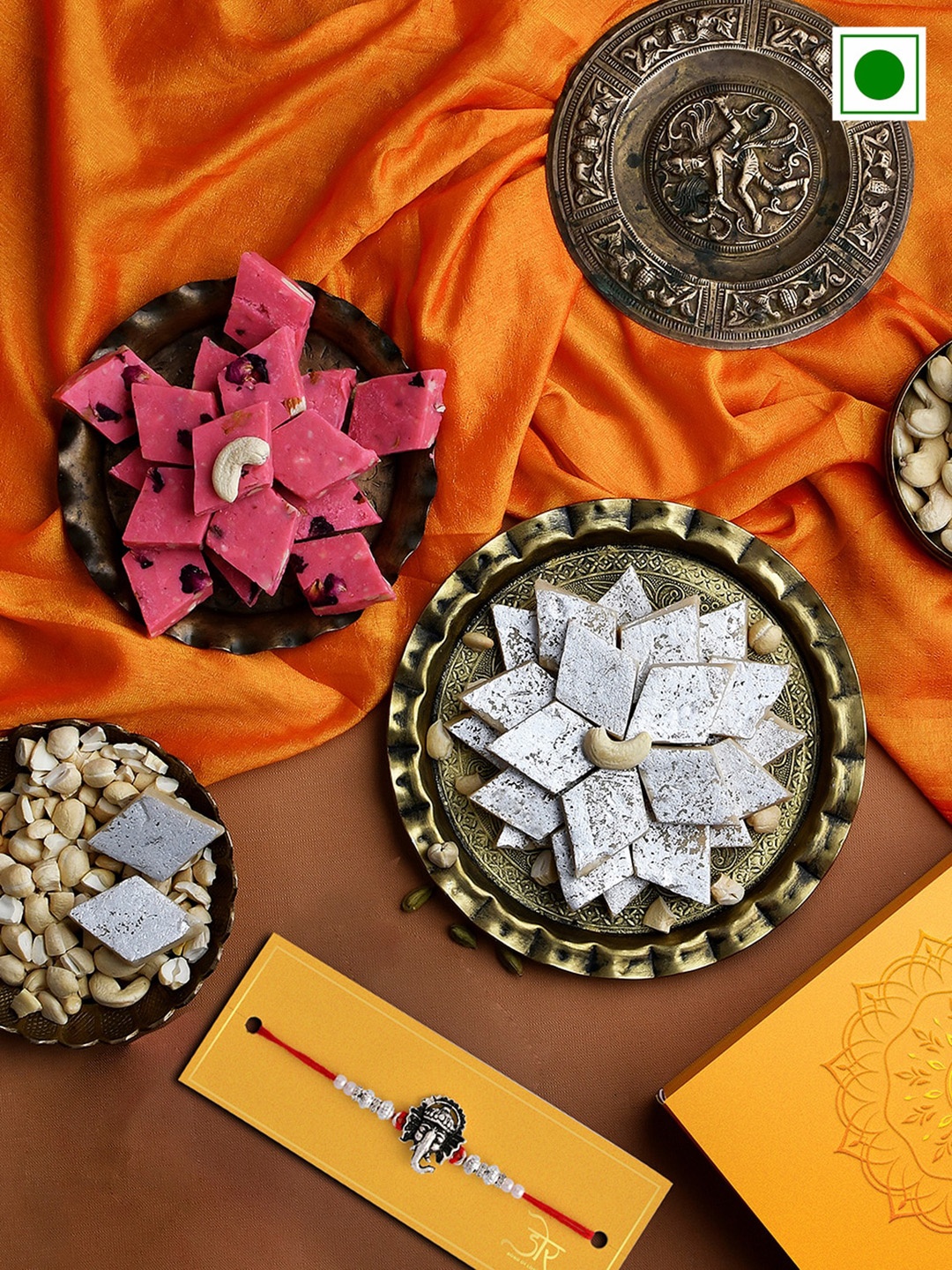 RawFruit Ganesh Charm Rakhi With Roli Chawal & Sweets Gifts Set-200 gms Each, Silver
RawFruit Ganesh Charm Rakhi With Roli Chawal & Sweets Gifts Set-200 gms Each, Silver