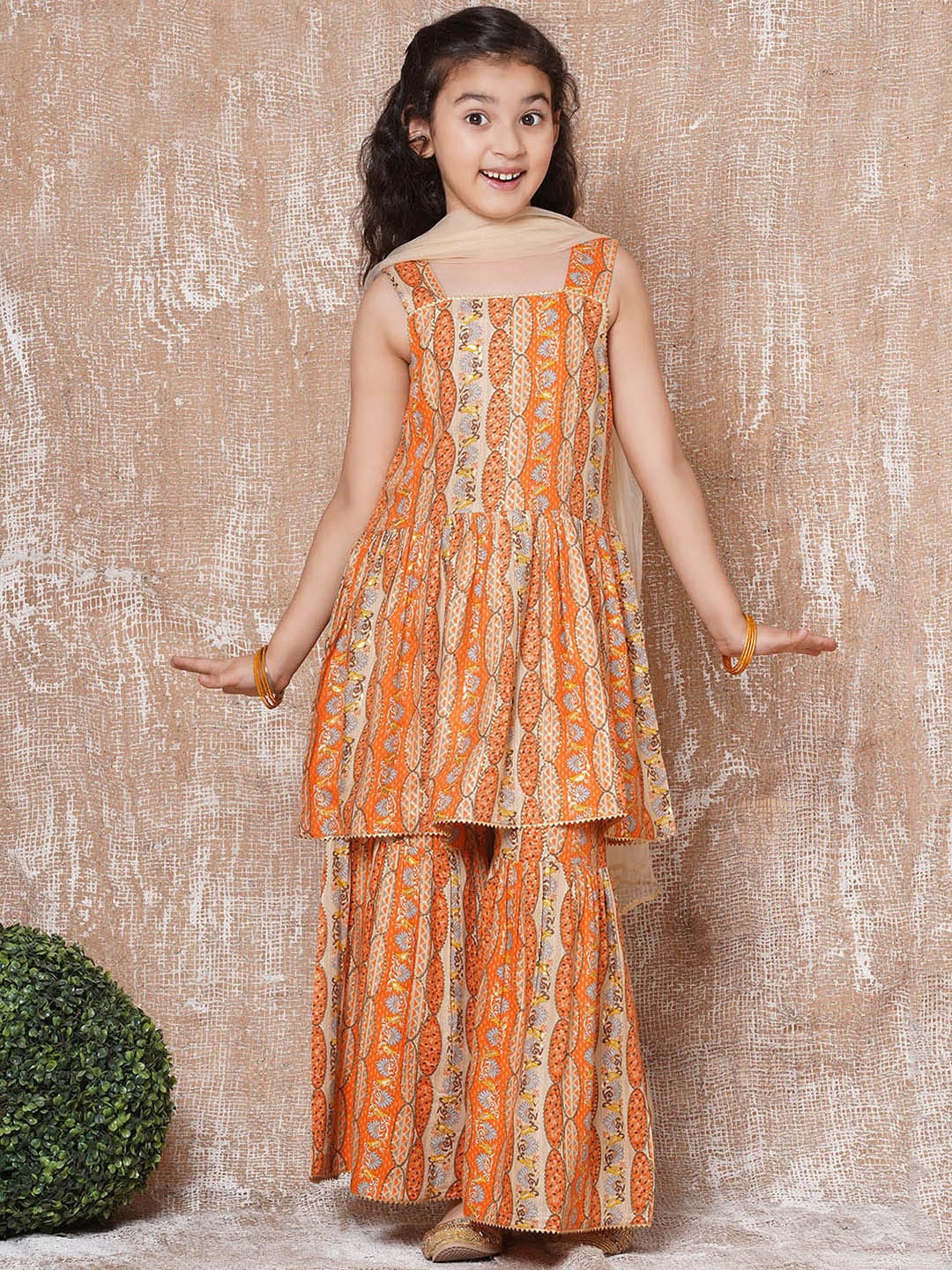 Aj DEZInES Girls Floral Printed Empire Pure Cotton Kurta with Sharara & With Dupatta, Orange
Aj DEZInES Girls Floral Printed Empire Pure Cotton Kurta with Sharara & With Dupatta, Orange