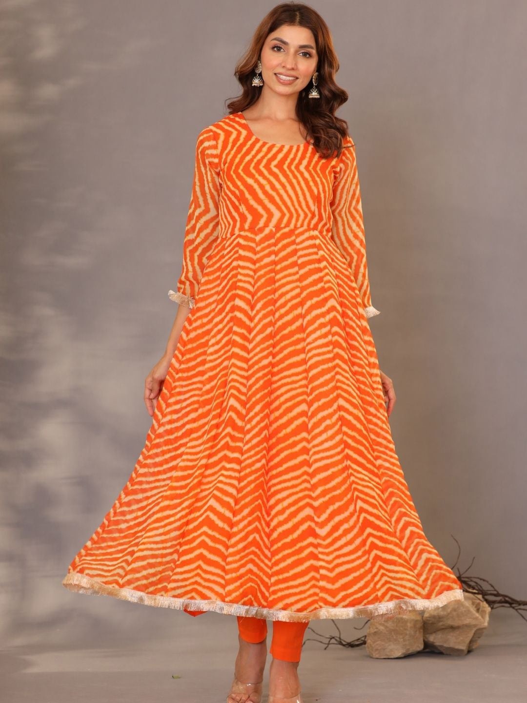 HOUSE OF JAMOTI Striped Gotta Patti Anarkali Georgette Kurta with Trousers & Dupatta, Orange
HOUSE OF JAMOTI Striped Gotta Patti Anarkali Georgette Kurta with Trousers & Dupatta, Orange