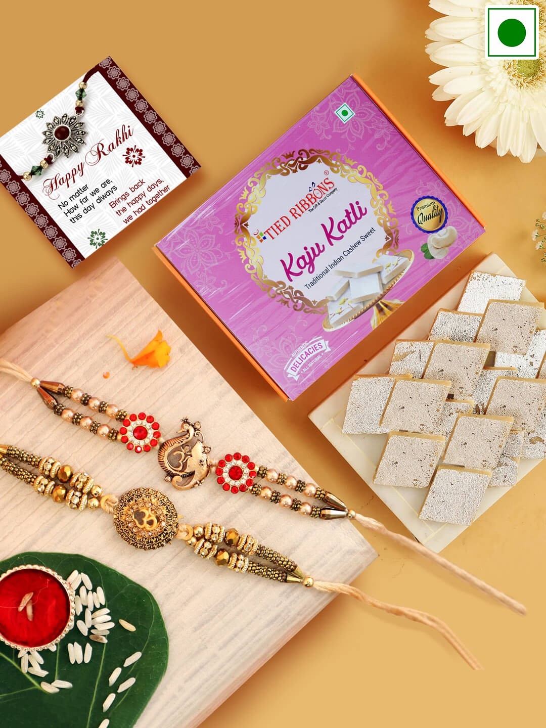 TIED RIBBONS Set Of 2 Stone Studded & Beaded Rakhis & Kaju Katli Sweets 200 gms, Gold
TIED RIBBONS Set Of 2 Stone Studded & Beaded Rakhis & Kaju Katli Sweets 200 gms, Gold