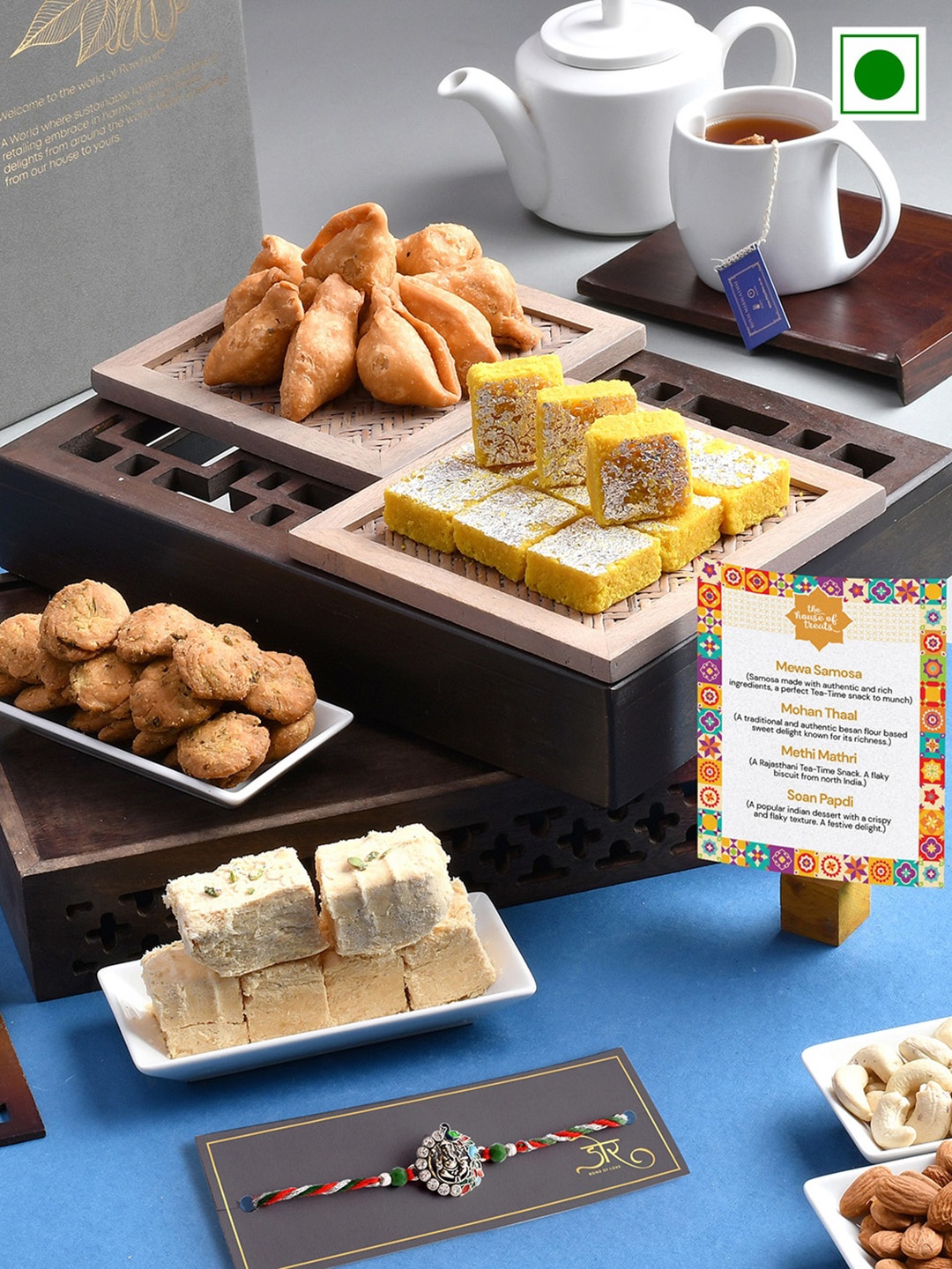 RawFruit Ganesha Stones-Studded Rakhi With Sweet Savoury Gift Set-200gms Each, Silver
RawFruit Ganesha Stones-Studded Rakhi With Sweet Savoury Gift Set-200gms Each, Silver
