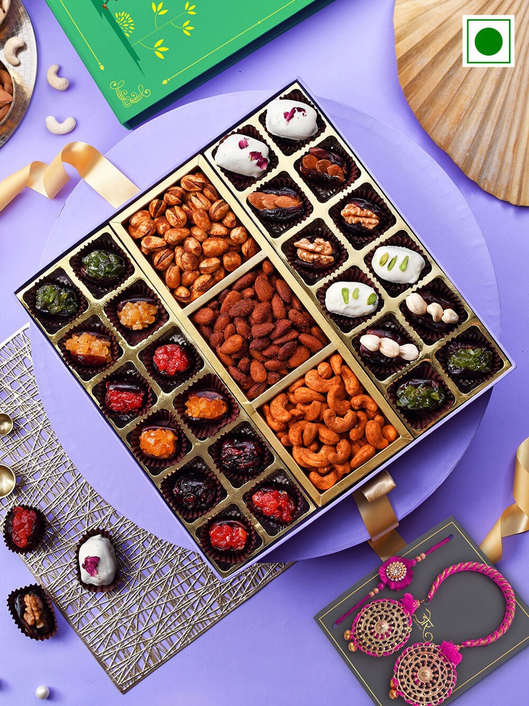 RawFruit Set of 2 Rakhi with Dates & Chocolate with Roasted Dry Fruit Gift Set, Gold
RawFruit Set of 2 Rakhi with Dates & Chocolate with Roasted Dry Fruit Gift Set, Gold