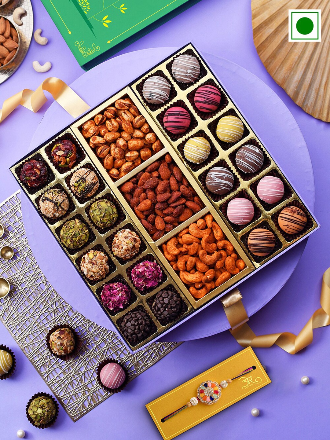 RawFruit Stone Studded Rakhi With Laddoo Marjipan & Roasted Dry Fruit Gift Set, Gold
RawFruit Stone Studded Rakhi With Laddoo Marjipan & Roasted Dry Fruit Gift Set, Gold