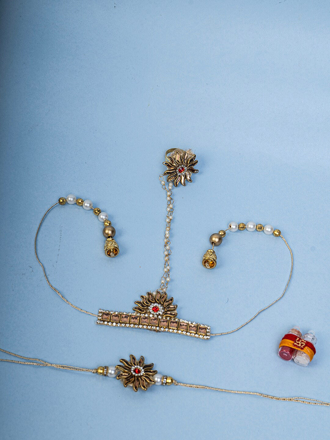 PANASH Set Of 2 Gold-Plated Stone-Studded & Beaded Rakhis With Roli Chawal 
PANASH Set Of 2 Gold-Plated Stone-Studded & Beaded Rakhis With Roli Chawal