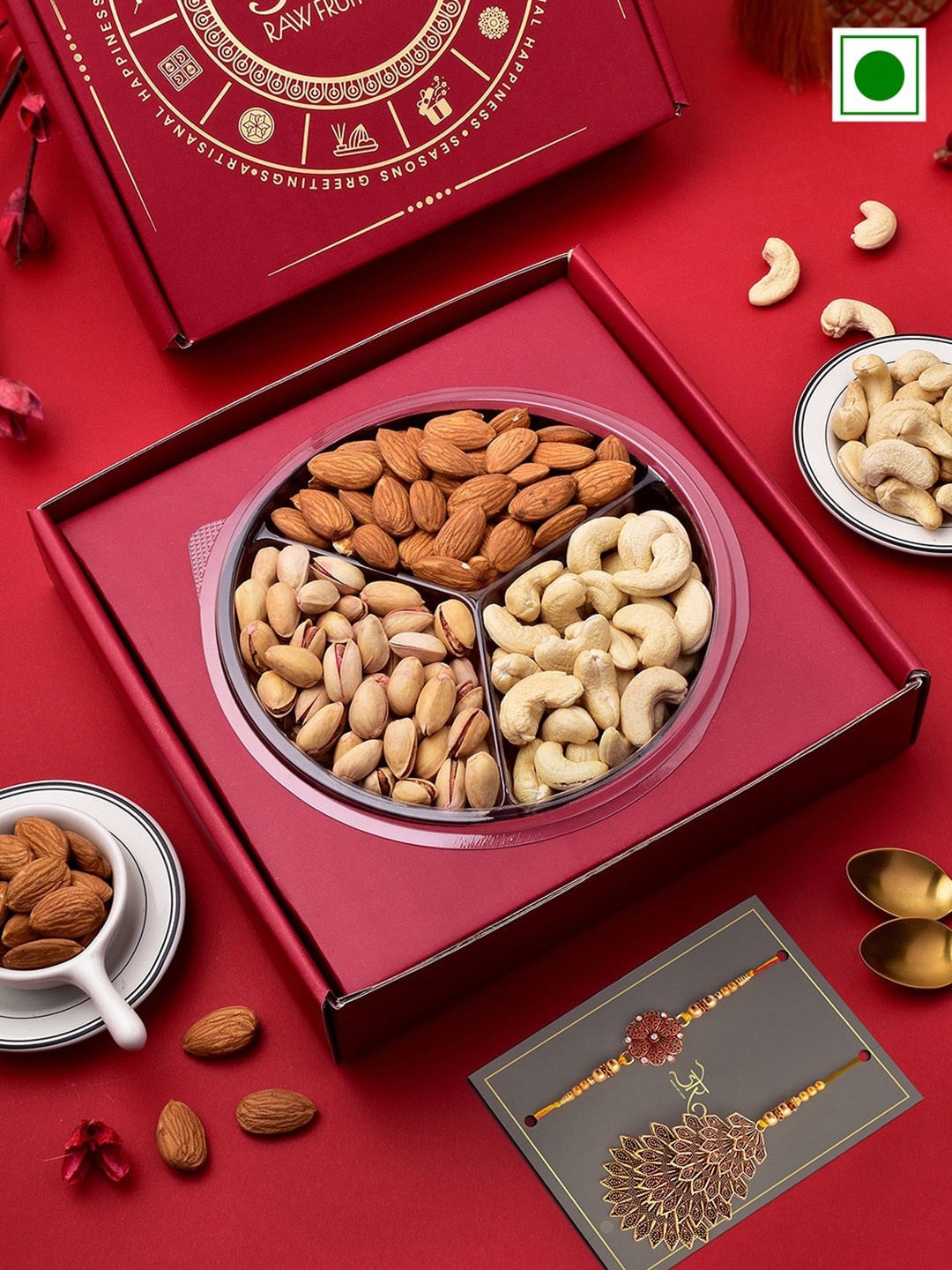 RawFruit Set of 2 Stone-Studded Flower Rakhis With Cashew Almond Pista Gifts 100g Each, Red
RawFruit Set of 2 Stone-Studded Flower Rakhis With Cashew Almond Pista Gifts 100g Each, Red