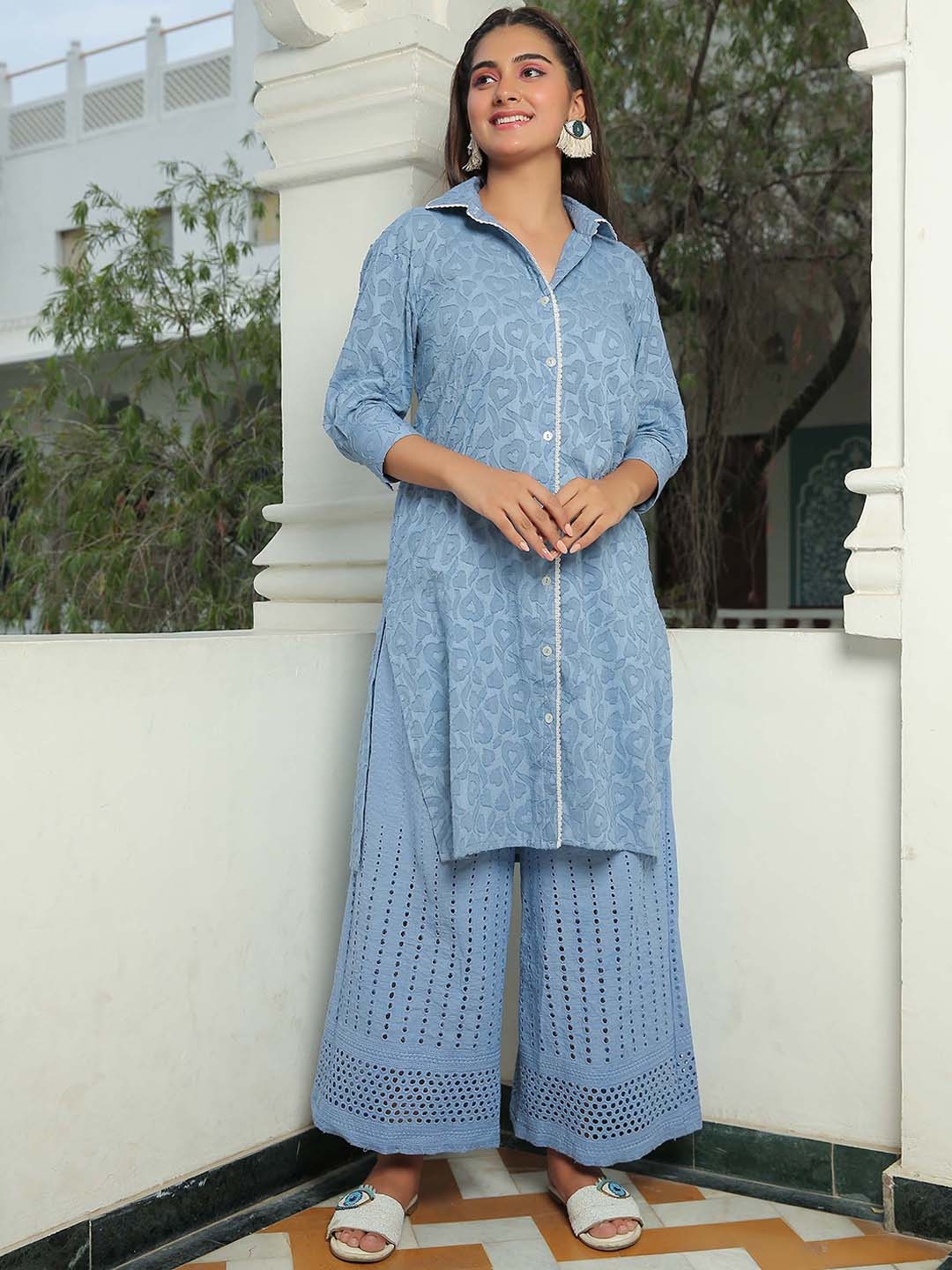 KAORI BY SHREYA AGARWAL Ethnic Motifs Printed Shirt Collar Pure Cotton Kurta with Palazzos, Blue
KAORI BY SHREYA AGARWAL Ethnic Motifs Printed Shirt Collar Pure Cotton Kurta with Palazzos, Blue