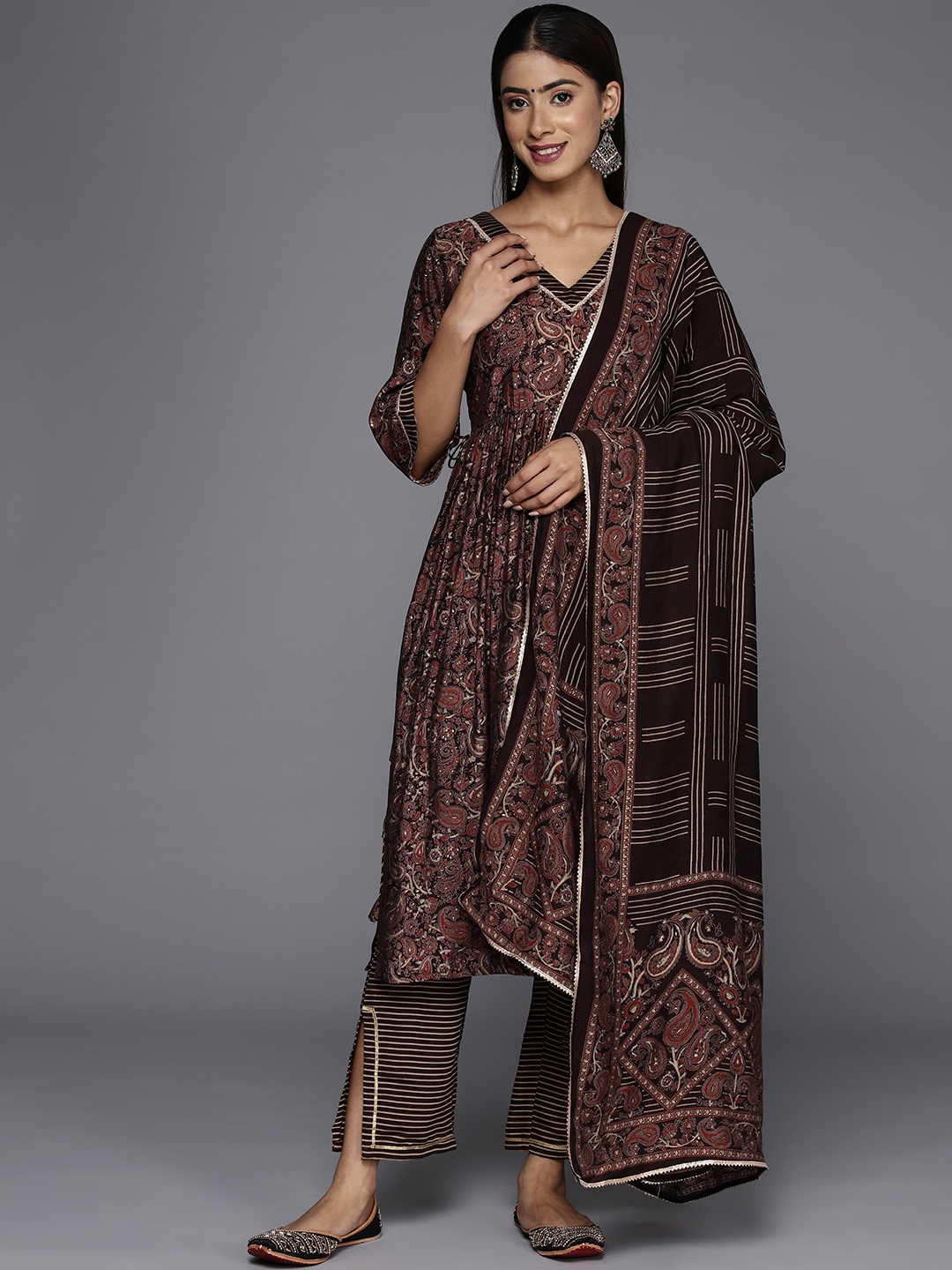 Libas Women Paisley Printed High Slit Gotta Patti Kurta with Trousers & With Dupatta, Brown
Libas Women Paisley Printed High Slit Gotta Patti Kurta with Trousers & With Dupatta, Brown
