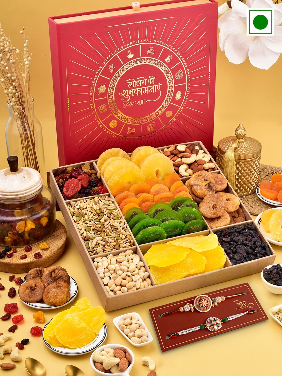 RawFruit Set Of 2 Stone Studded Rakhis With Roli Chawal & Dryfruits Gift Set, Green
RawFruit Set Of 2 Stone Studded Rakhis With Roli Chawal & Dryfruits Gift Set, Green