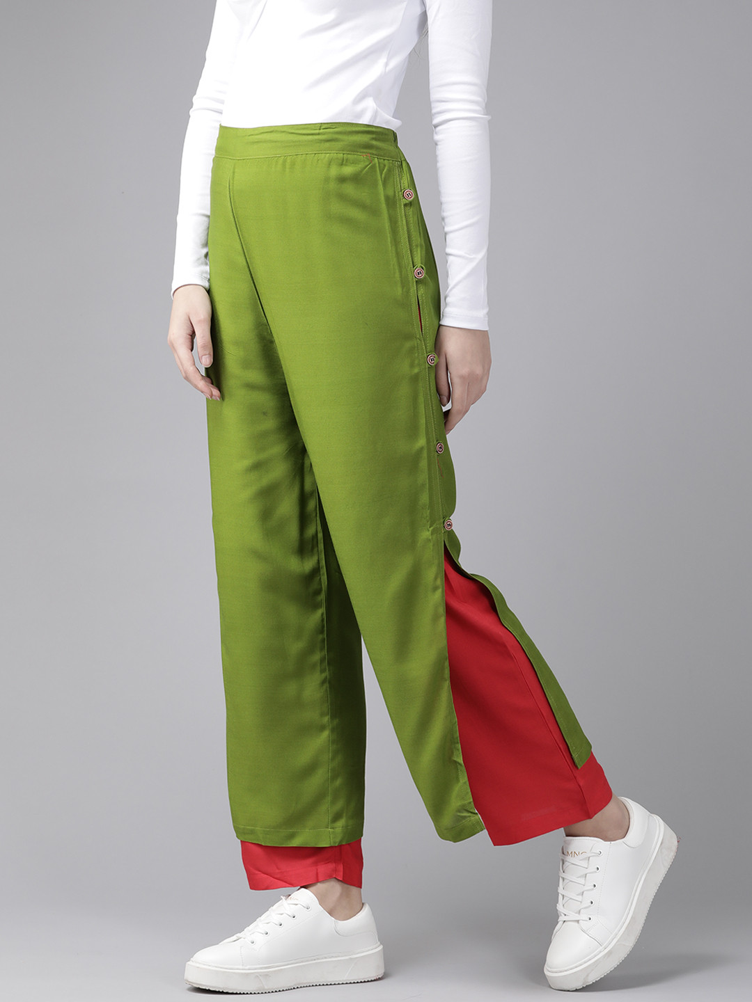 Aarika Women Colourblocked Flared Cotton Palazzos, Olive 
Aarika Women Colourblocked Flared Cotton Palazzos, Olive