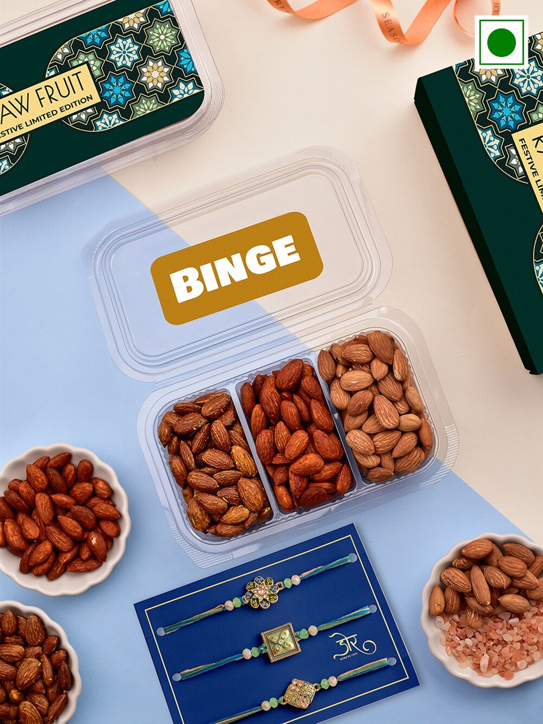 RawFruit Set Of 3 Stone Studded Rakhis With Roli Chawal & Almond Gift Set-80 gms Each, Blue
RawFruit Set Of 3 Stone Studded Rakhis With Roli Chawal & Almond Gift Set-80 gms Each, Blue