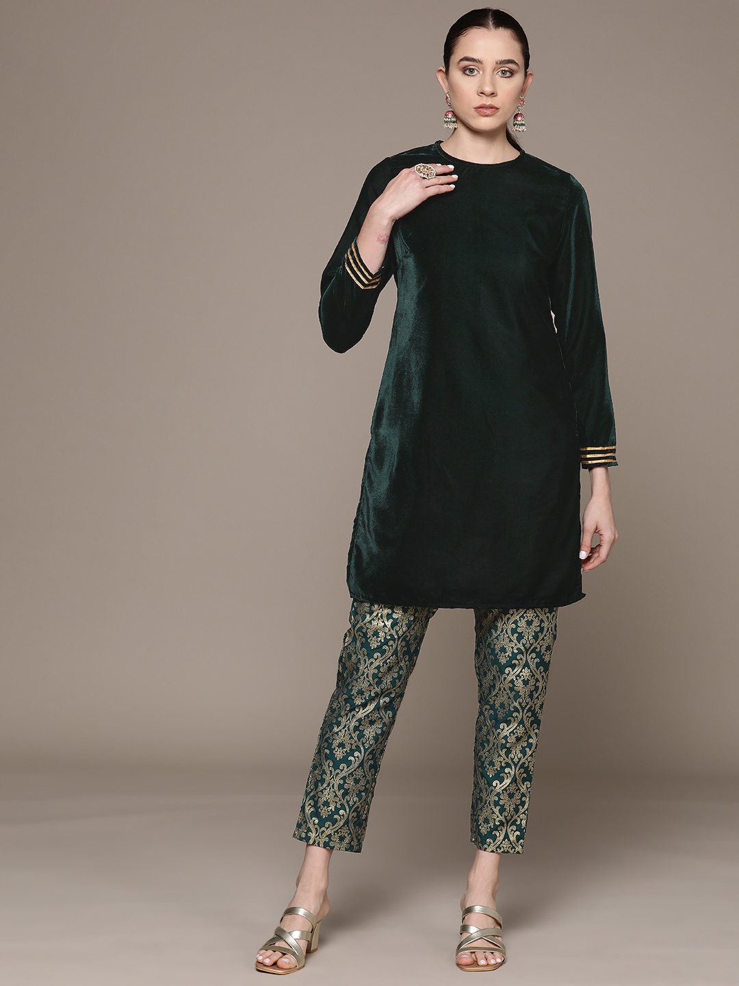 Moda Rapido Gotta Patti Detailed Velvet-Finish Kurta with Ethnic Motifs Printed Trousers, Green
Moda Rapido Gotta Patti Detailed Velvet-Finish Kurta with Ethnic Motifs Printed Trousers, Green