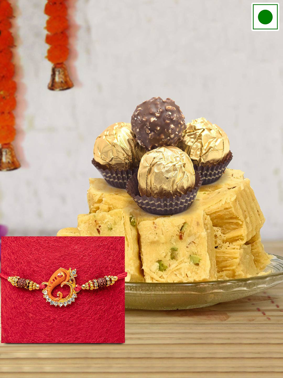 TIED RIBBONS Ganesh Charm Rakhi & Ferrero Rocher Chocolates & Soan Papdi Sweets-250 gms, Red
TIED RIBBONS Ganesh Charm Rakhi & Ferrero Rocher Chocolates & Soan Papdi Sweets-250 gms, Red