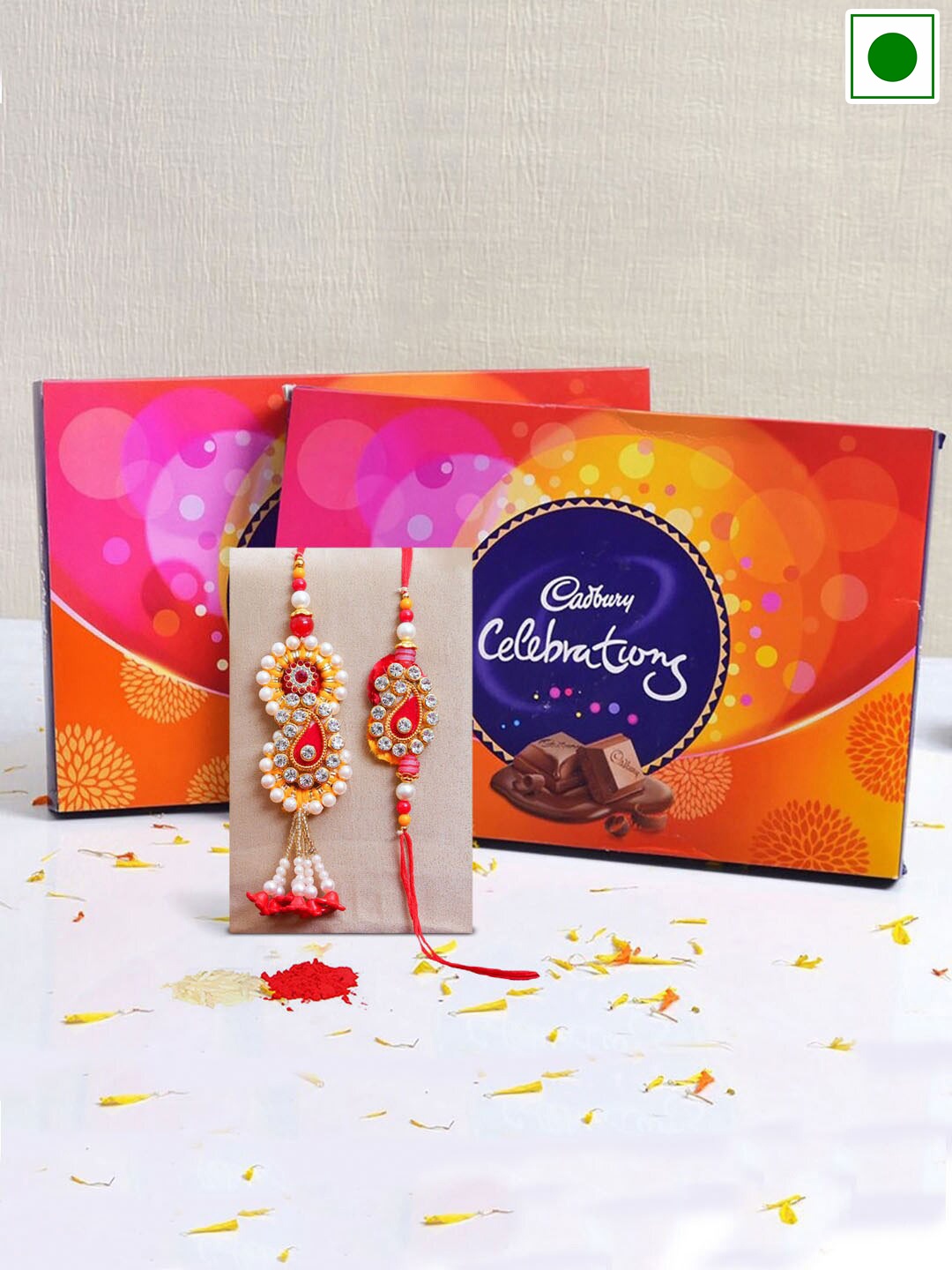 TIED RIBBONS Set Of 2 Rakhis With Cadbury Celebration Chocolates Set-193.5 gms Each, Red
TIED RIBBONS Set Of 2 Rakhis With Cadbury Celebration Chocolates Set-193.5 gms Each, Red