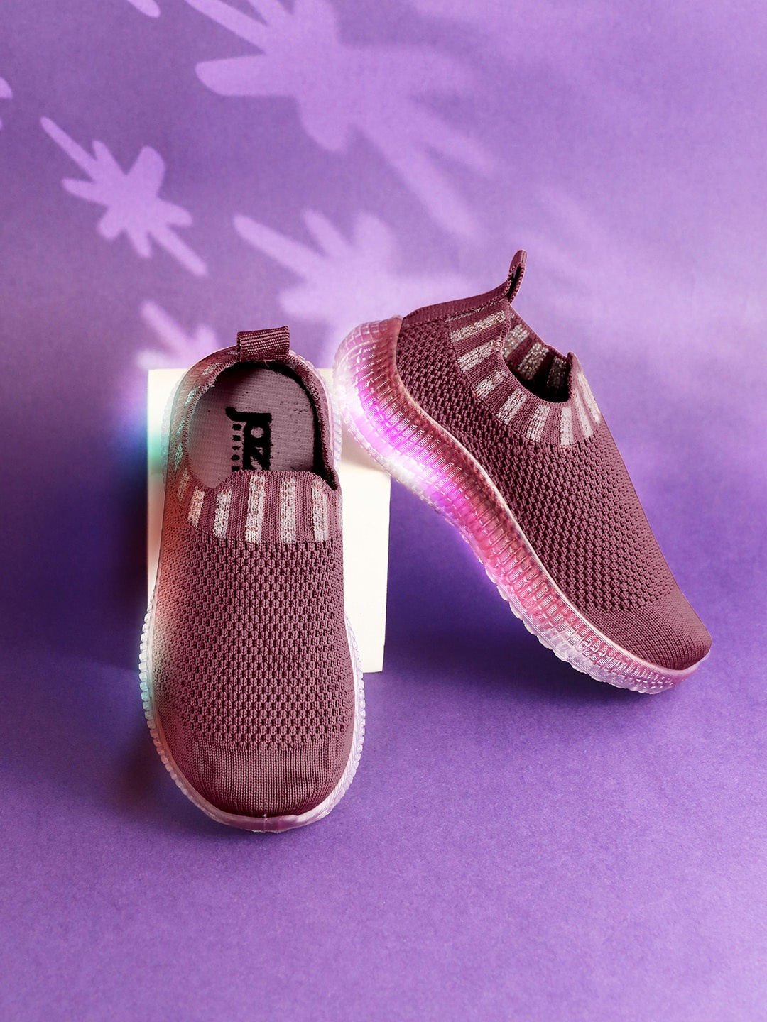 Jazzy Juniors Kids Textured Lightweight Mesh Slip-On Sneakers With LED Lights, Purple
Jazzy Juniors Kids Textured Lightweight Mesh Slip-On Sneakers With LED Lights, Purple
