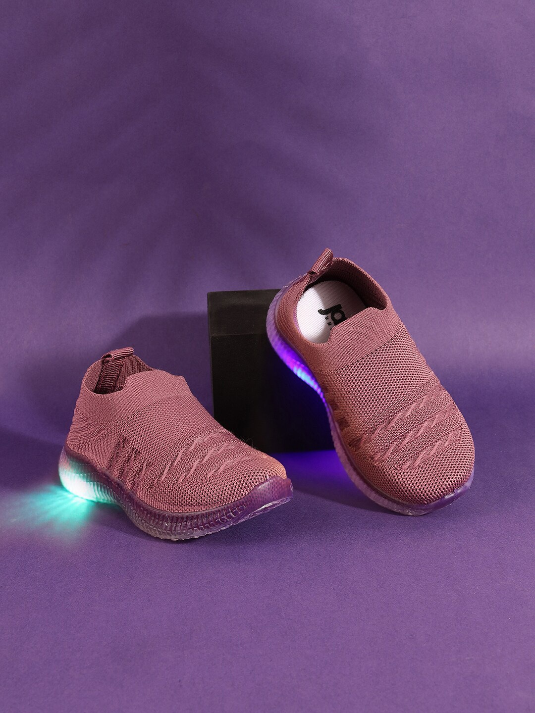 Jazzy Juniors Kids Textured Lightweight Mesh Slip-On Sneakers With LED Lights, Purple
Jazzy Juniors Kids Textured Lightweight Mesh Slip-On Sneakers With LED Lights, Purple