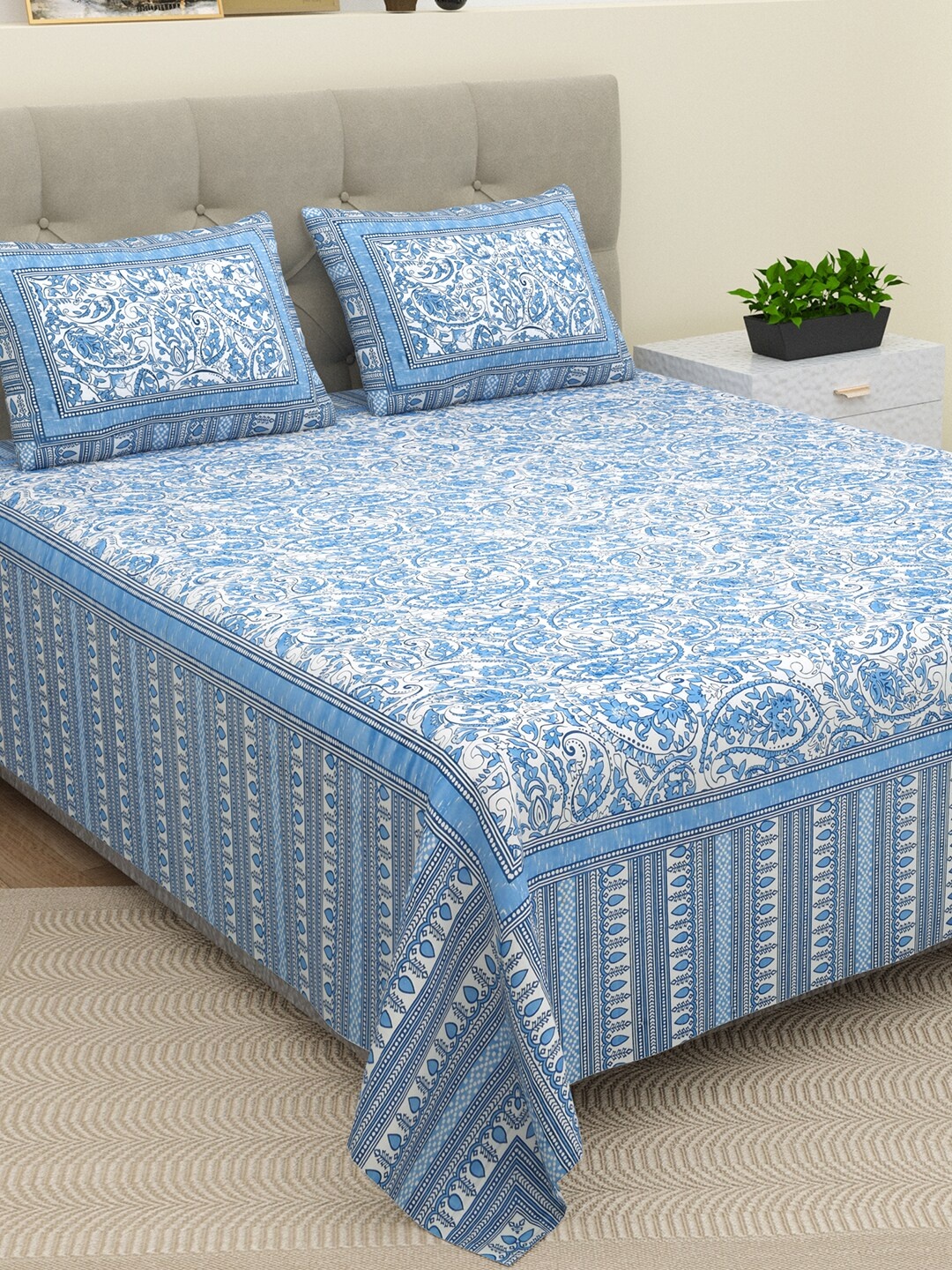 BELLA CASA Ethic Blue & White Printed Cotton 180 TC King Bedsheet with 2 Pillow Covers
BELLA CASA Ethic Blue & White Printed Cotton 180 TC King Bedsheet with 2 Pillow Covers