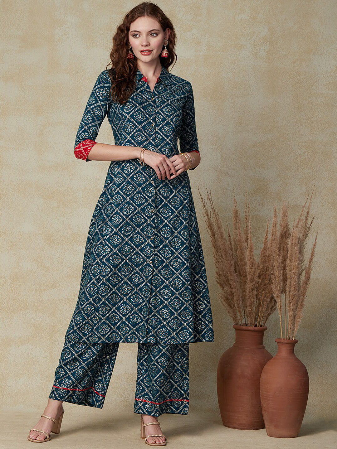 FASHOR Teal Blue Bandhani Printed A-Line Kurta With Palazzos 
FASHOR Teal Blue Bandhani Printed A-Line Kurta With Palazzos