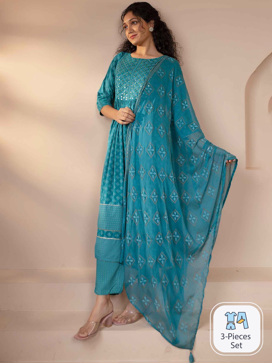 Nehamta Floral Printed Pleated Mirror Work Kurta With Trousers & Dupatta, Turquoise blue
Nehamta Floral Printed Pleated Mirror Work Kurta With Trousers & Dupatta, Turquoise blue