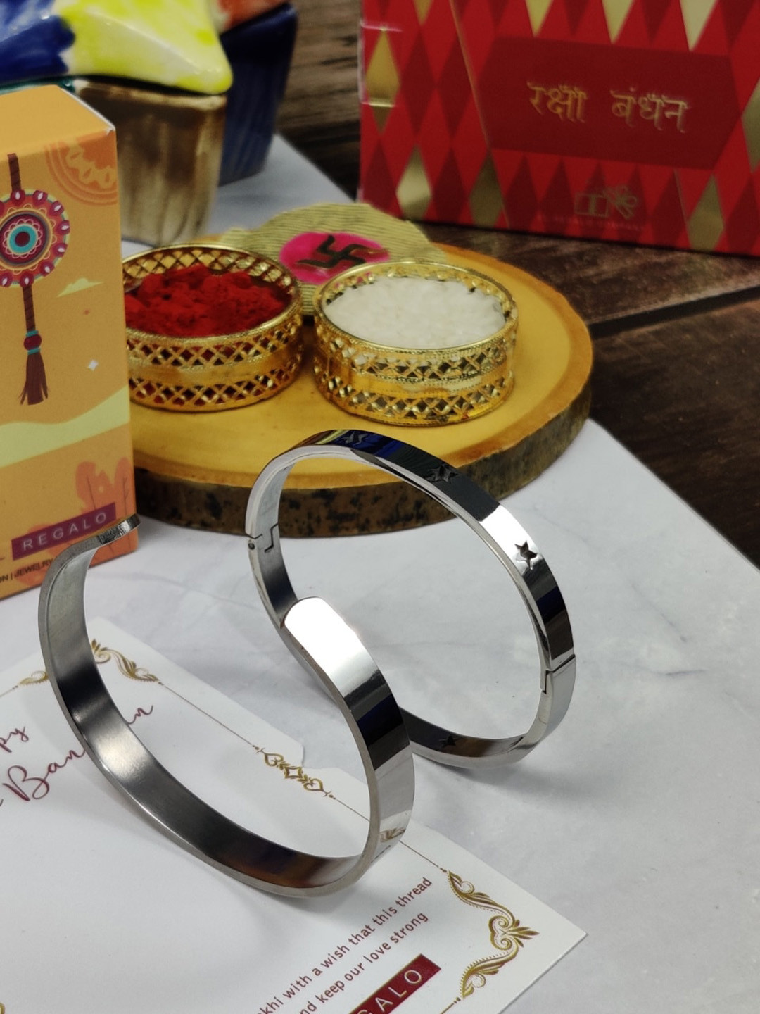 EL REGALO Bhaiya Bhabhi Set of 2 Bracelet Stainless Steel Rakhi With Roli Chawal Card, Silver
EL REGALO Bhaiya Bhabhi Set of 2 Bracelet Stainless Steel Rakhi With Roli Chawal Card, Silver