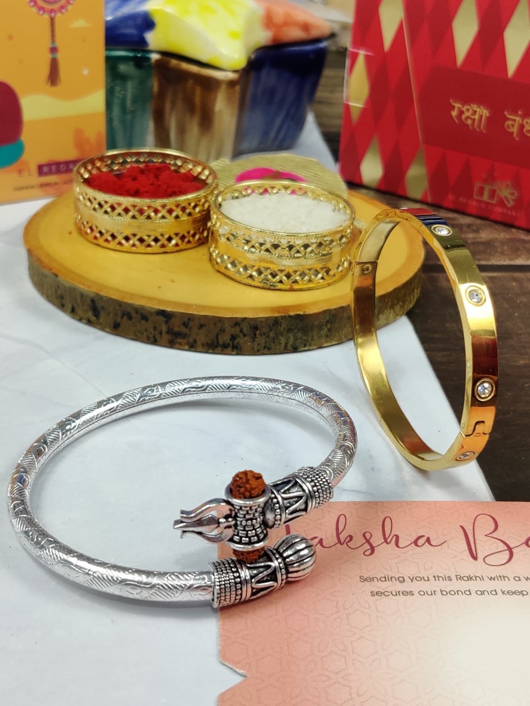EL REGALO Bhaiya Bhabhi Set Of 2 Kada Stainless Steel Rakhi With With Card Roli Chawal, Gold
EL REGALO Bhaiya Bhabhi Set Of 2 Kada Stainless Steel Rakhi With With Card Roli Chawal, Gold