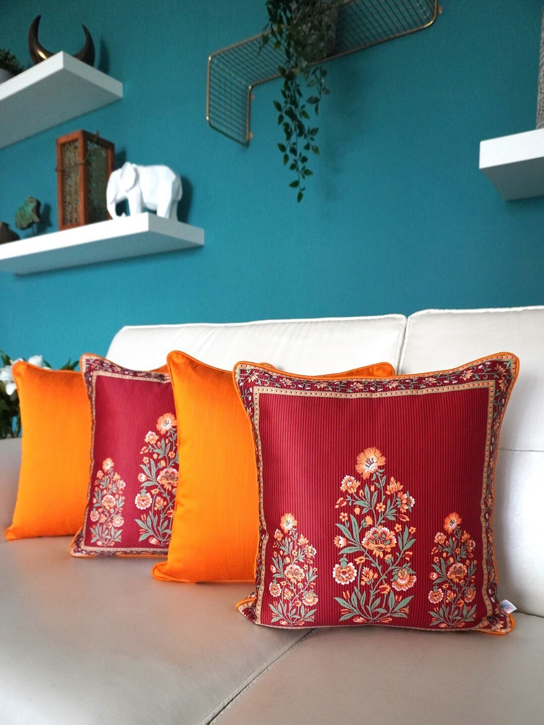 TARA- Sparkling Homes Red & Orange 4-Pieces Ethnic Motifs Square Cushion Covers
TARA- Sparkling Homes Red & Orange 4-Pieces Ethnic Motifs Square Cushion Covers