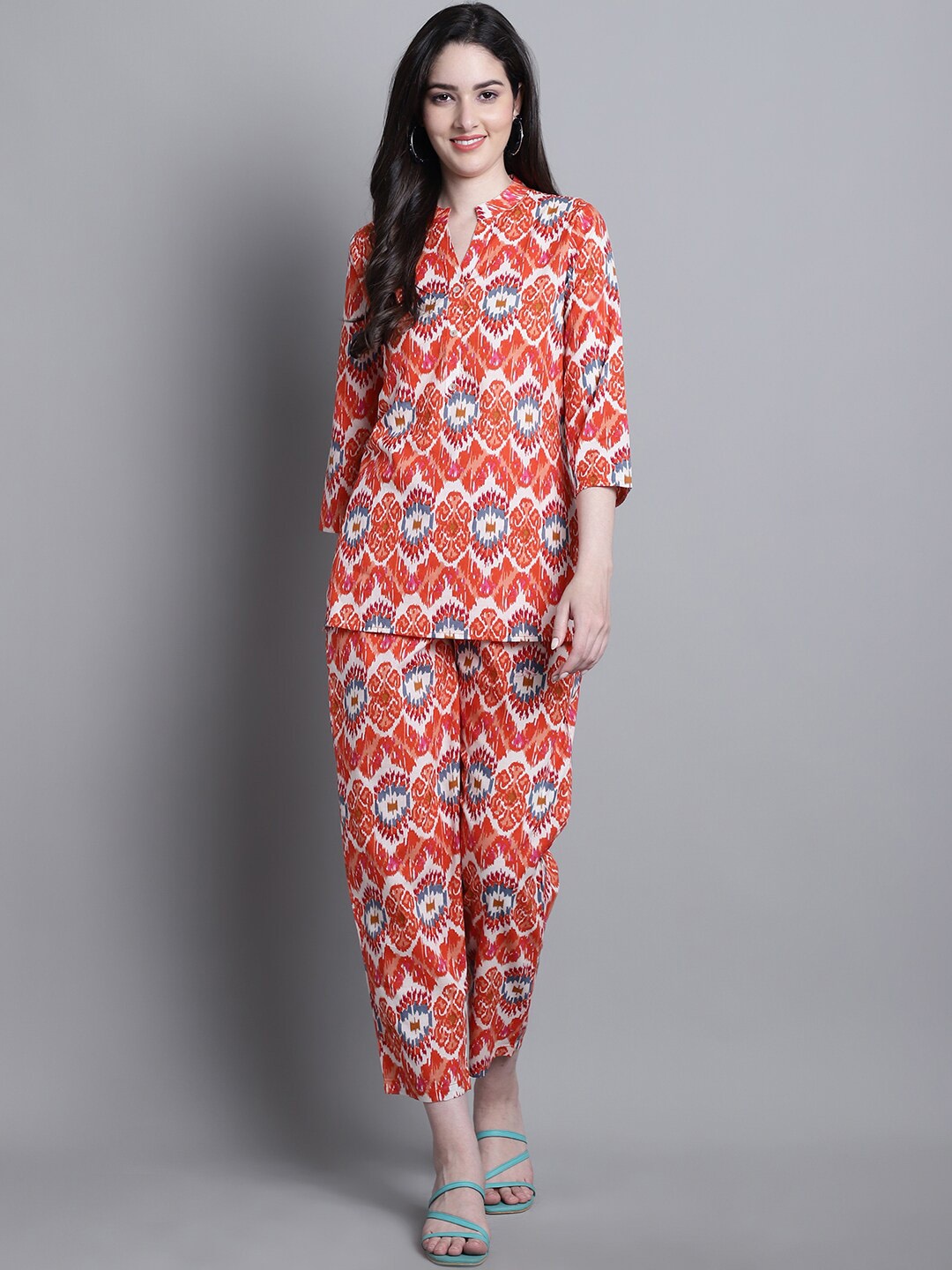 Prakrti White & Orange-Coloured Ethnic Motifs Printed Pure Cotton Tunic With Trousers
Prakrti White & Orange-Coloured Ethnic Motifs Printed Pure Cotton Tunic With Trousers