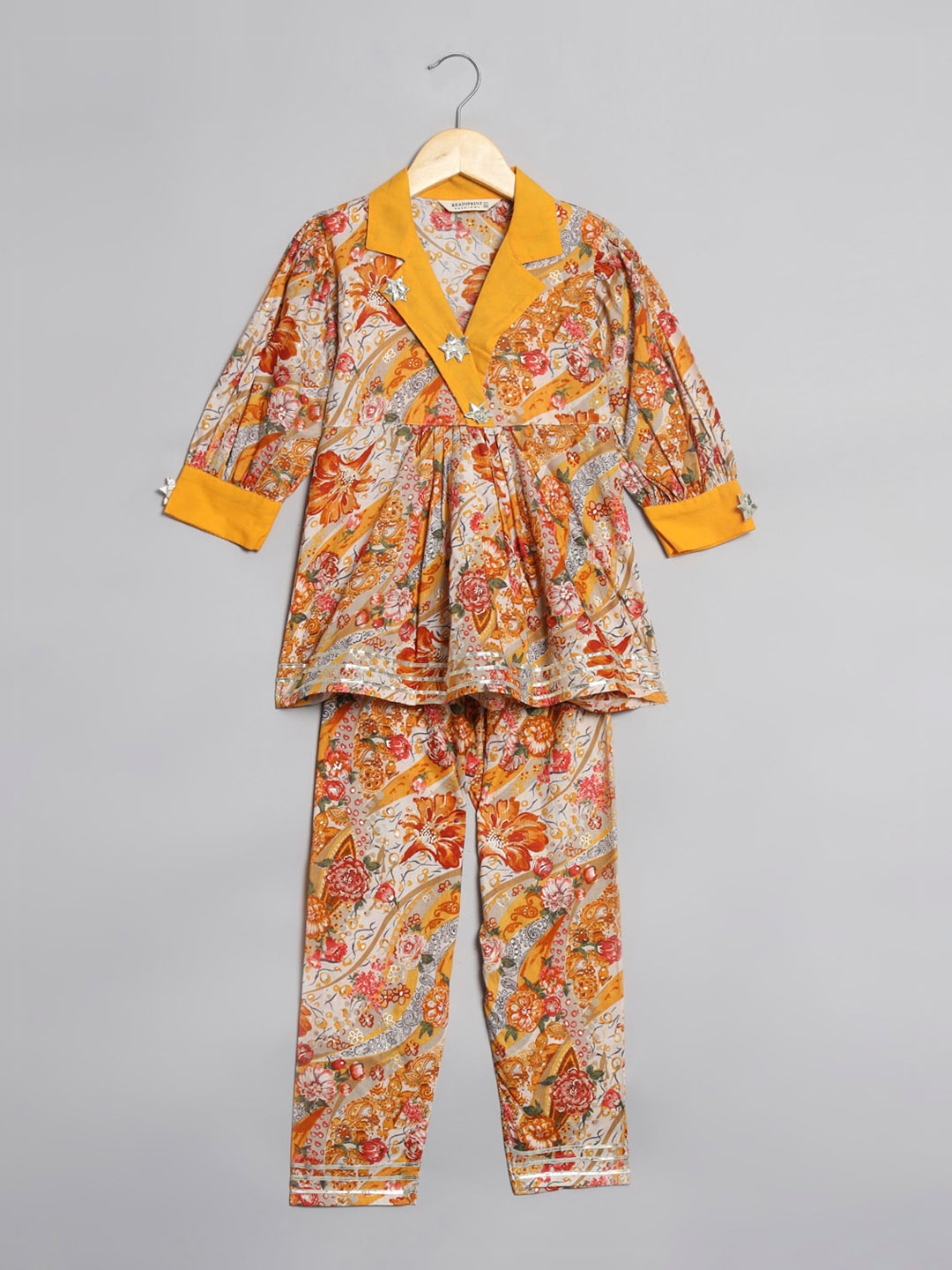 Readiprint Fashions Girls Floral Printed Empire Gotta Patti Cotton Kurta With Trousers, Mustard
Readiprint Fashions Girls Floral Printed Empire Gotta Patti Cotton Kurta With Trousers, Mustard
