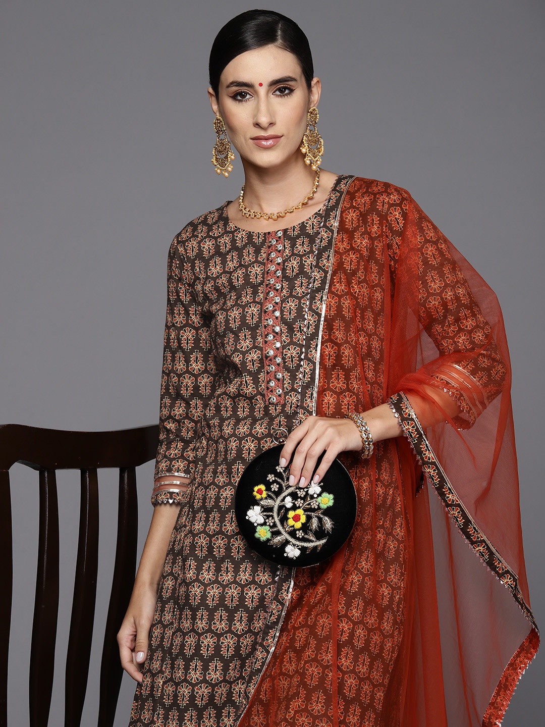 Indo Era Women Ethnic Motifs Printed Thread Work Kurta with Palazzos & With Dupatta, Brown
Indo Era Women Ethnic Motifs Printed Thread Work Kurta with Palazzos & With Dupatta, Brown