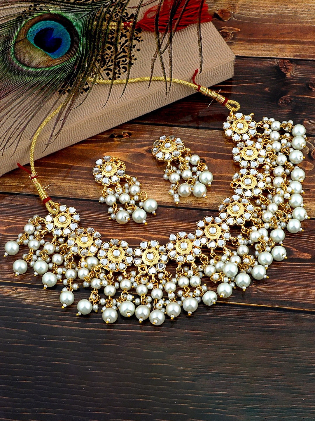 MANSIYAORANGE Gold-Plated Kundan Studded & Beaded Necklace With Earrings Jewellery Set
MANSIYAORANGE Gold-Plated Kundan Studded & Beaded Necklace With Earrings Jewellery Set