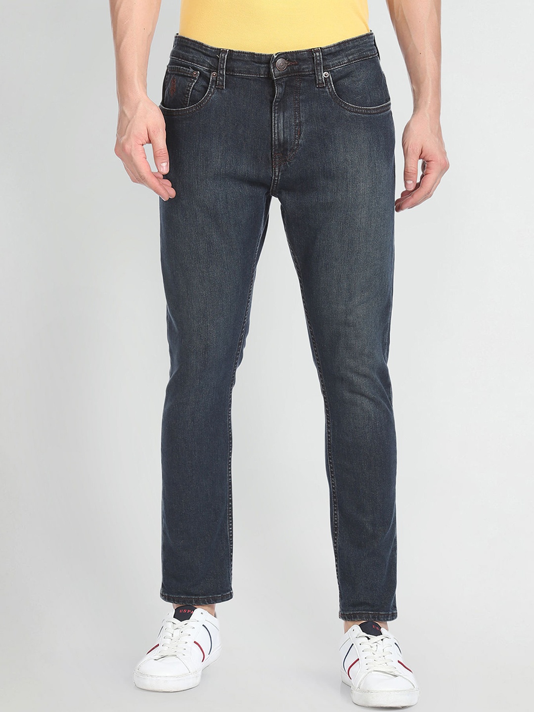 U.S. Polo Assn. Denim Co. Men Tapered Fit Mid-Rise Light Fade Stretchable Jeans, Blue
U.S. Polo Assn. Denim Co. Men Tapered Fit Mid-Rise Light Fade Stretchable Jeans, Blue